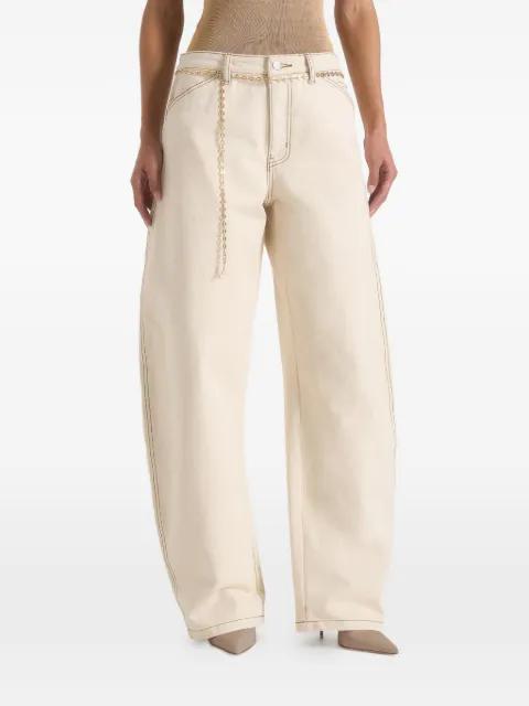 Enora in cream hourglass jeans with chain by MANIERE DE VOIR