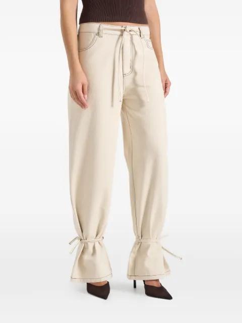 Faye in cream wide mid rise jeans with tie-waist by MANIERE DE VOIR