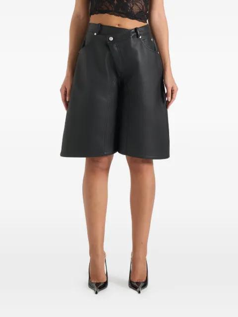 Hazel in black wrapover bermuda shorts by MANIERE DE VOIR