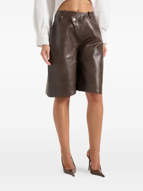 Hazel  in brown wrap-over bermuda shorts by MANIERE DE VOIR
