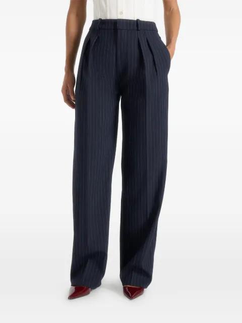 Julie in navy pinstripe twin pleated tailored trousers by MANIERE DE VOIR