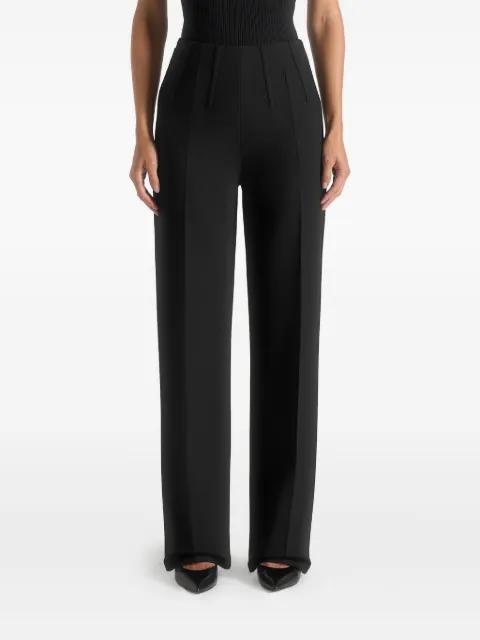 Rafaela in black corset waist tailored trousers by MANIERE DE VOIR