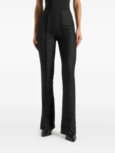 Therese in black tailored button detail trousers by MANIERE DE VOIR