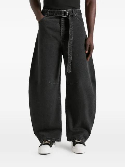 Xander in black barrel-leg jeans by MANIERE DE VOIR