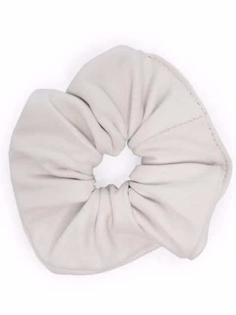 textured leather scrunchie by MANOKHI
