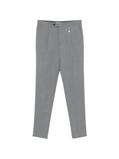pleated charm-detail trousers by MANUEL RITZ