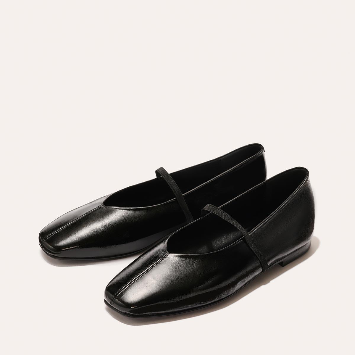 Black Mary Jane Flats With Black Crinkle-Gloss Nappa Finish by MARGAUX
