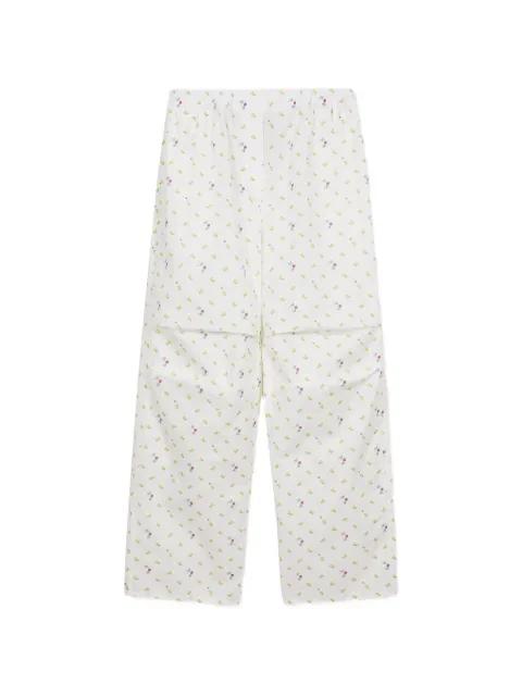 Peanuts Woodstock straight-leg trousers by MARGE SHERWOOD