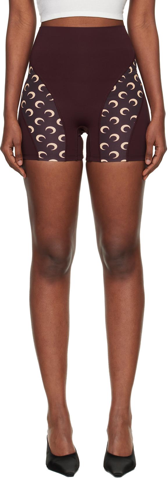 Burgundy Athleisure Moon Insert Mini Shorts by MARINE SERRE