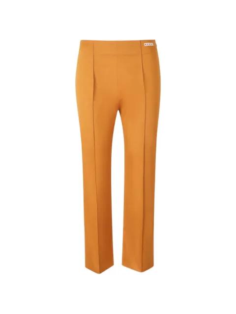 logo-patch pressed-crease trousers by MARNI