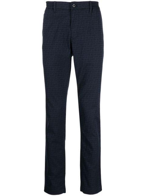 logo-print water-repellent trousers by MASTER BUNNY EDITION
