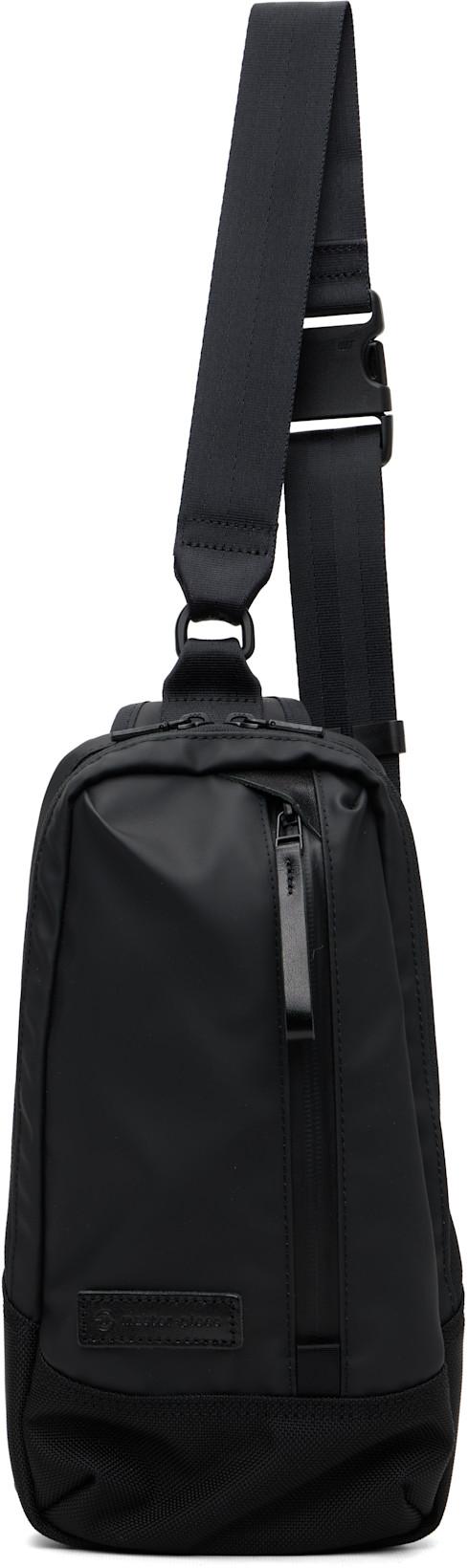 Black Slick Sling Bag by MASTER-PIECE