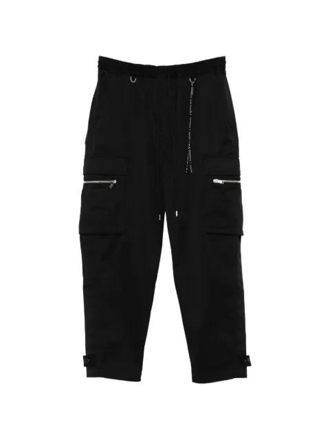 multi-pocket cargo pants by MASTERMIND