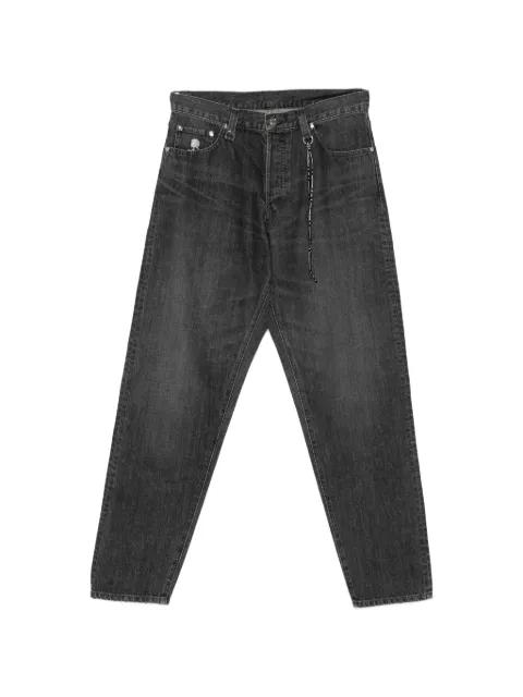 patched jeans by MASTERMIND