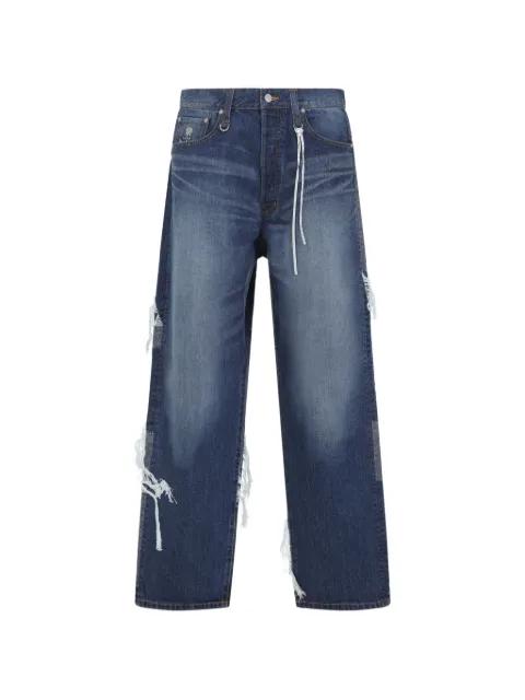 patchwork distressed jeans by MASTERMIND