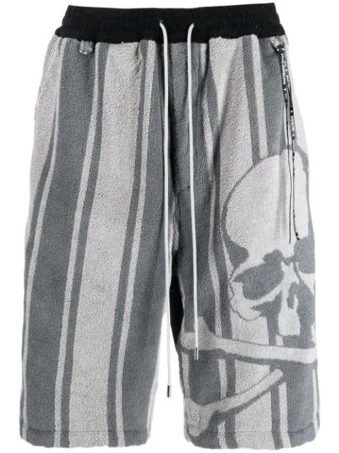 striped skull-print track shorts by MASTERMIND