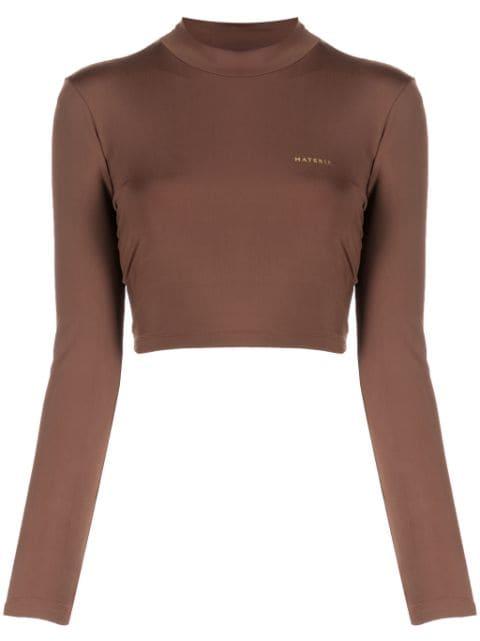 laminated-logo roll neck top by MATERIEL