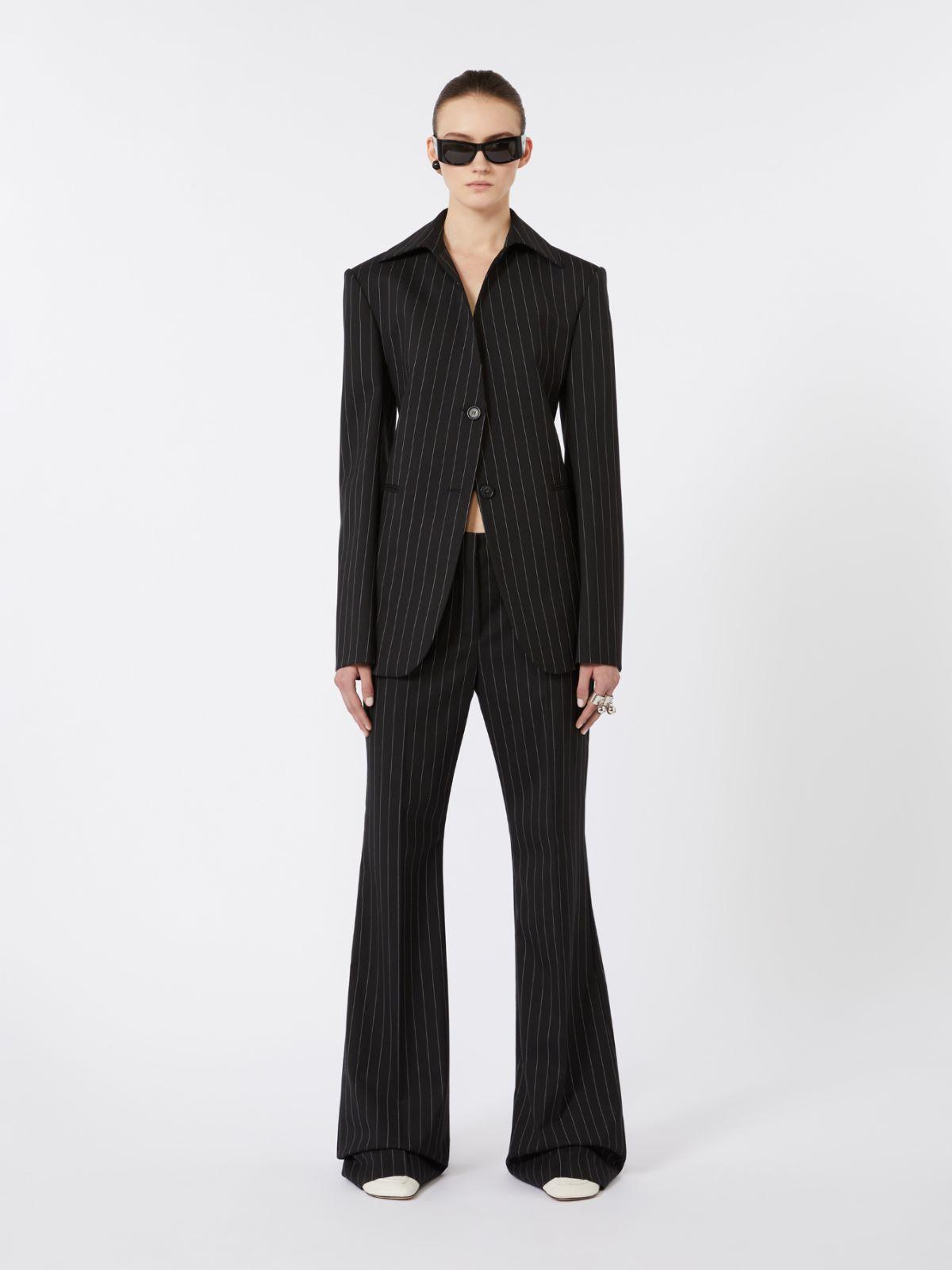 Flared pinstripe wool trousers by MAX MARA