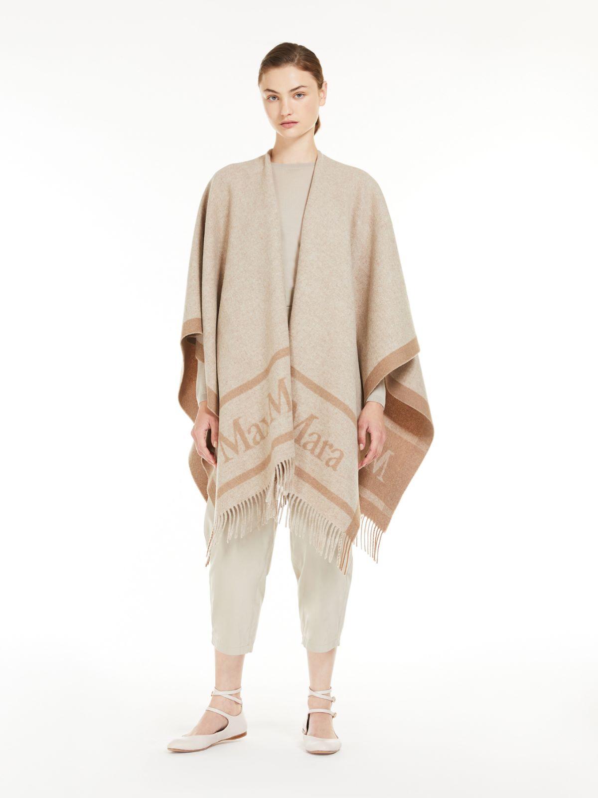 Jacquard wool poncho by MAX MARA