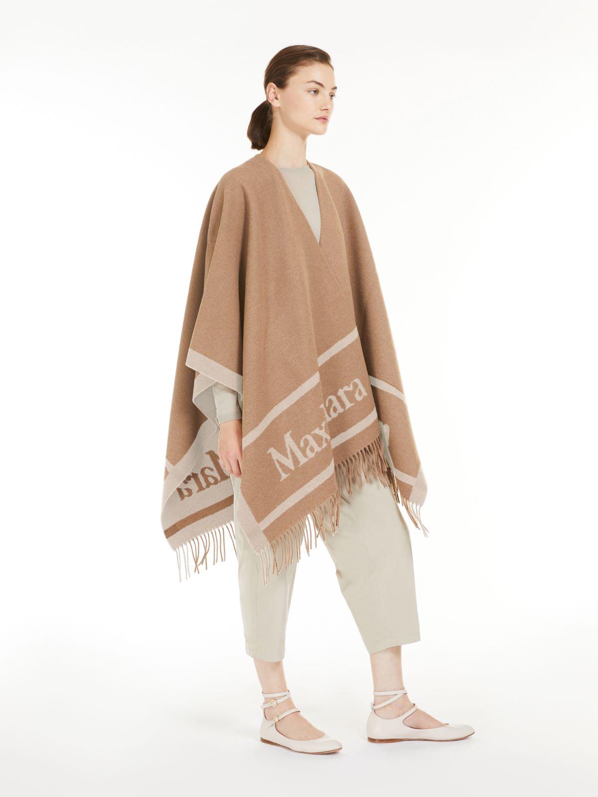 Jacquard wool poncho by MAX MARA