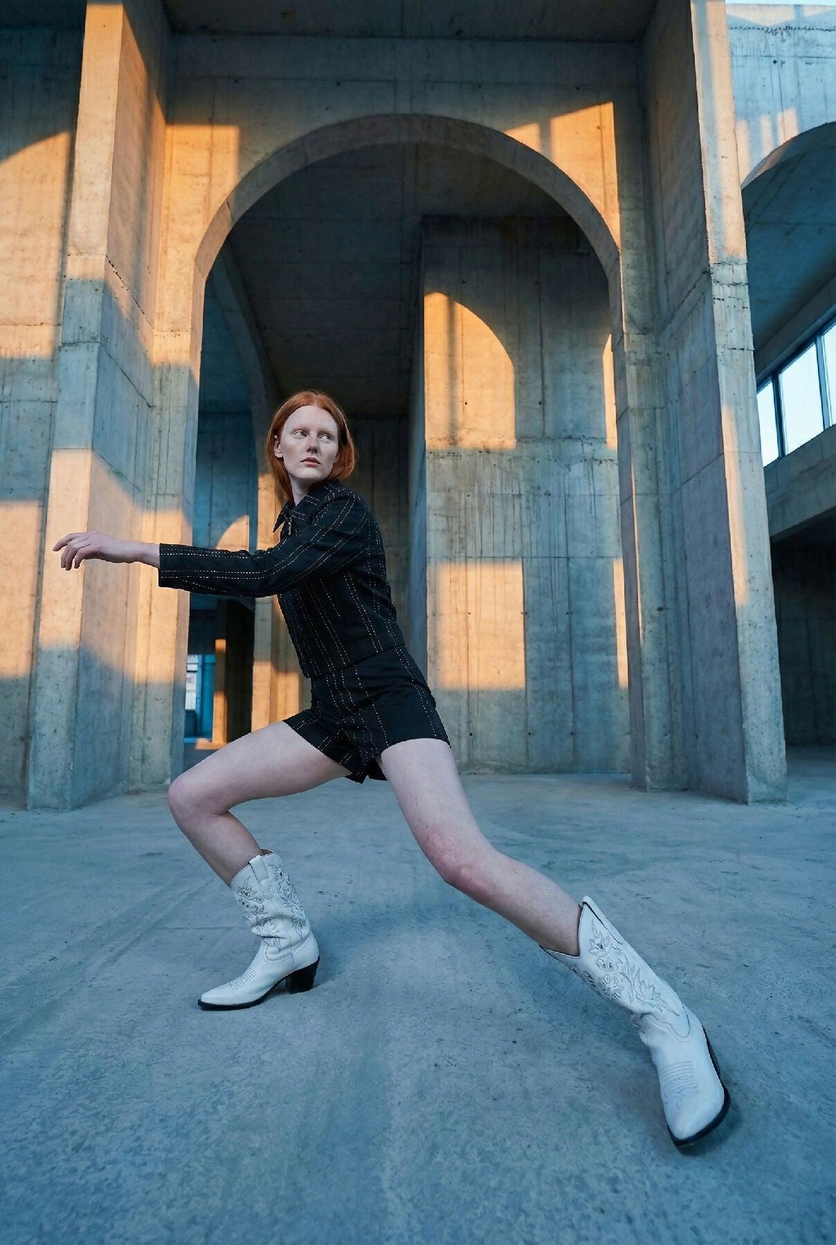 SABLE - Low Waist Mini Black Shorts with Asymmetric Stitch Detail by MAYAMU