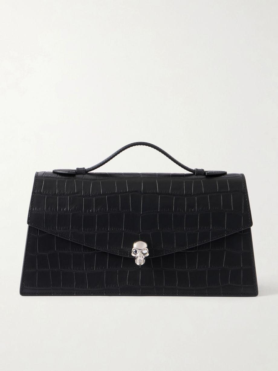 Skull embellished croc-effect leather clutch by MCQUEEN