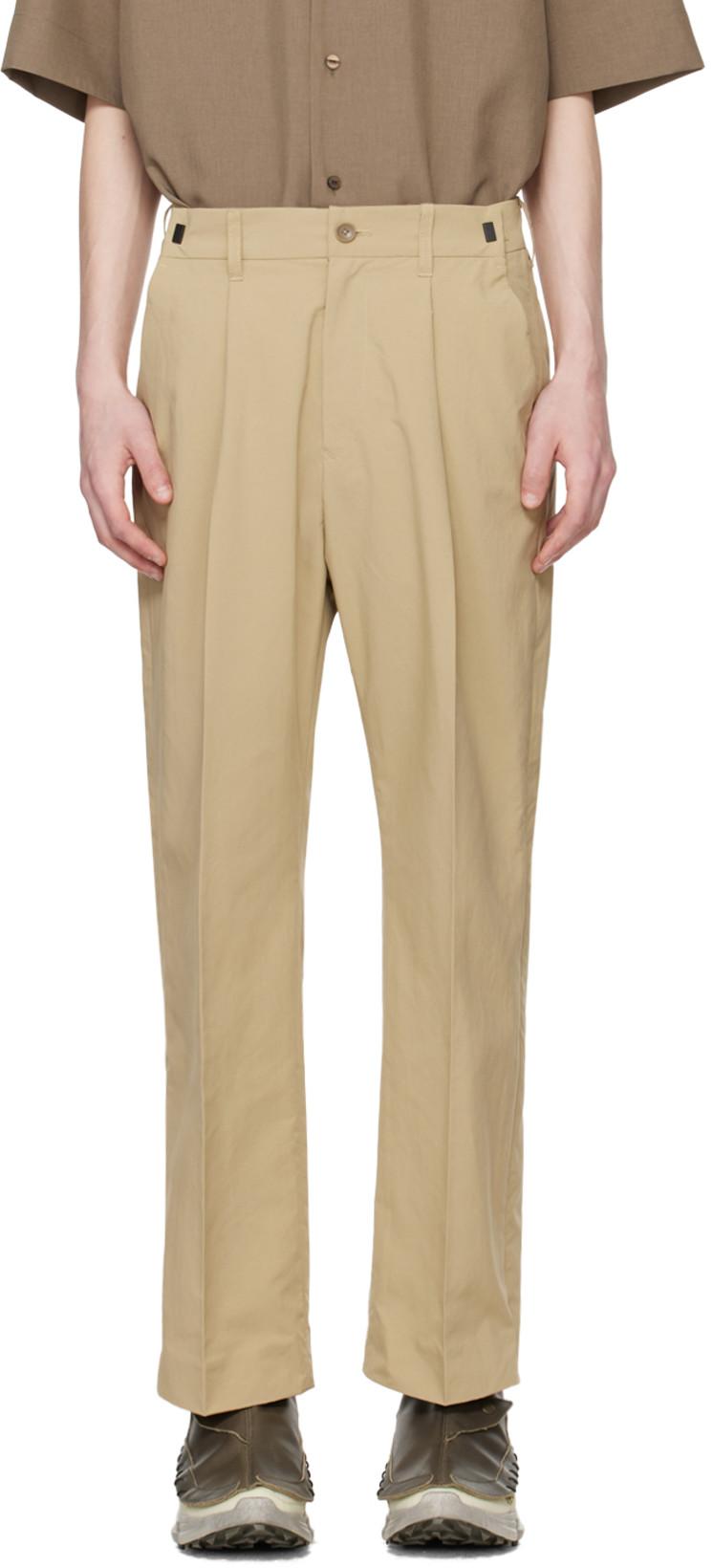 Beige Side Zip Trousers by MEANSWHILE