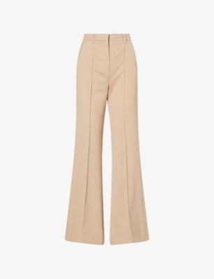 The Tailored Leg-Elongator Flared Woven Trousers by ME&EM