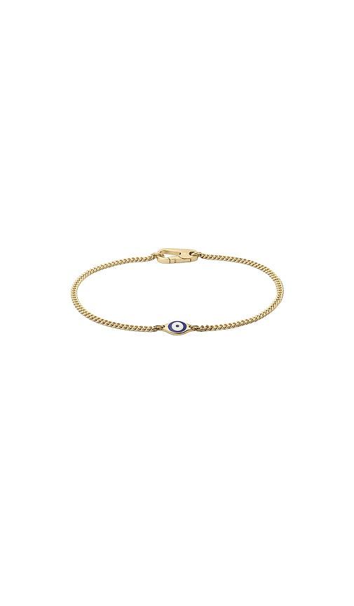 Miansai Single Blue Eye Bracelet in Metallic Gold by MIANSAI Miansai Single Blue Eye Bracelet in Metallic Gold by MIANSAI