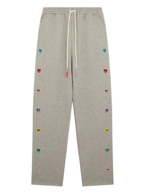 heart-detail track pants by MIRA MIKATI