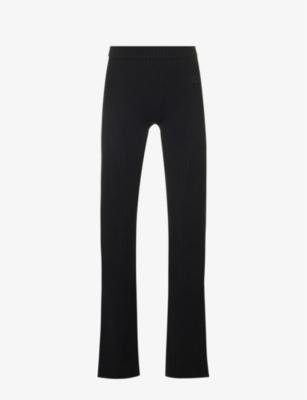 Brand-embroidered slim-fit knitted trousers by MISBHV