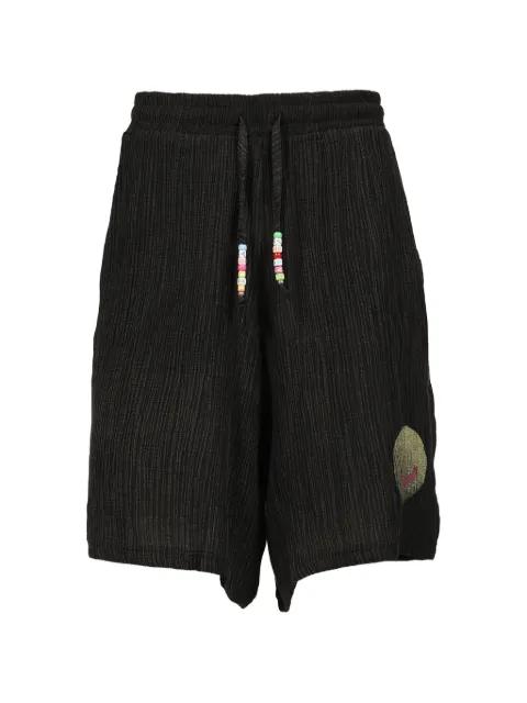 Smile bead-embellished shorts by MISBHV
