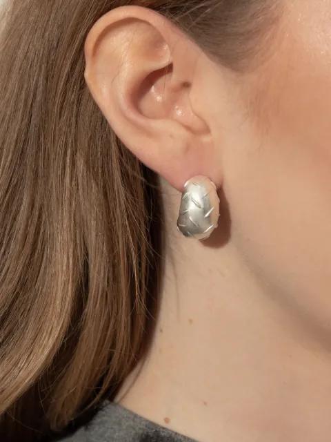 textured hoop earrings by MISBHV