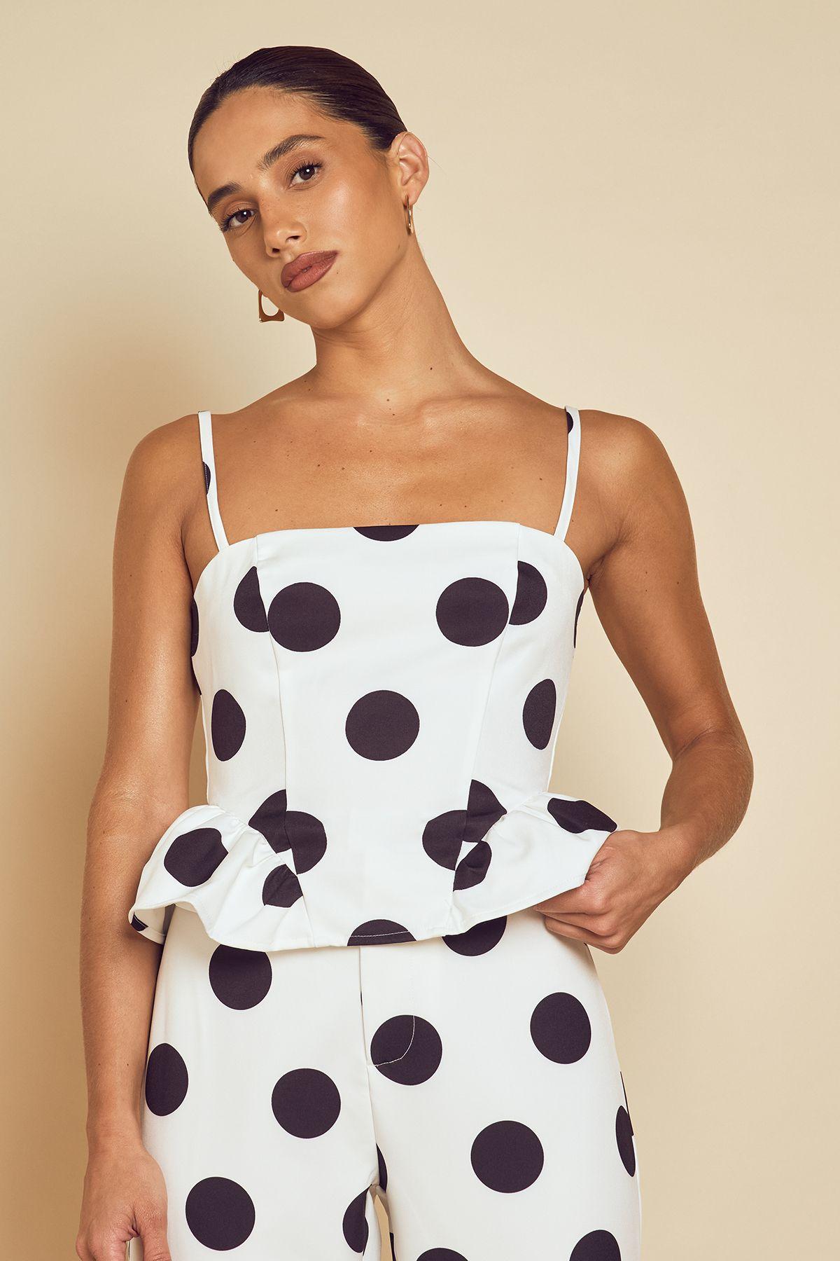 Tailored Polka Dot Peplum Top by MISSPAP
