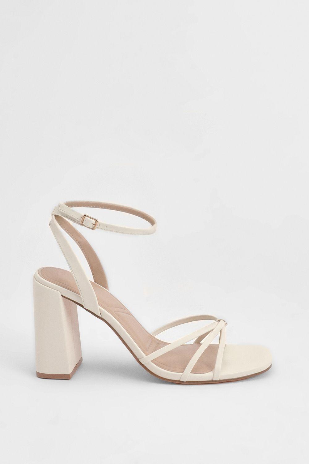 White Faux Leather Strappy Block Heel Sandals by MISSPAP