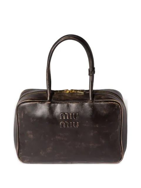 Beau logo-embossed leather shoulder bag by MIU MIU