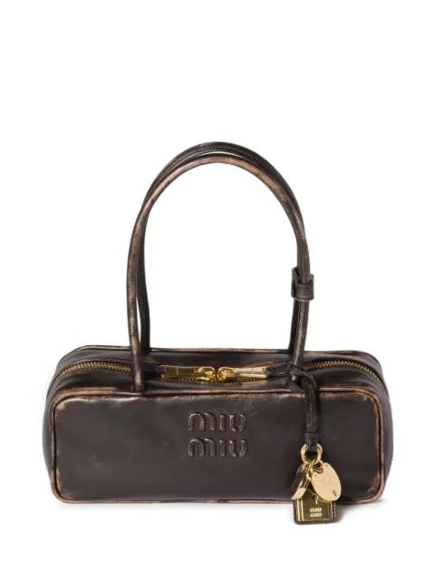 Beau logo-embossed tote bag by MIU MIU