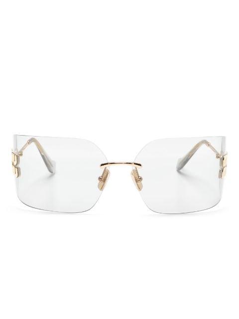 Rimless sunglasses by MIU MIU EYEWEAR