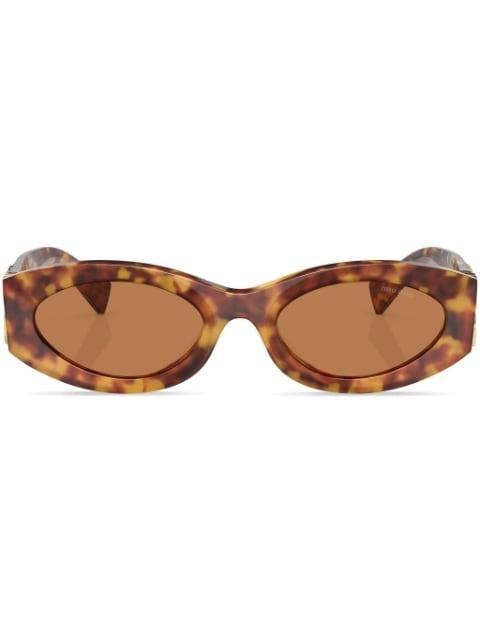 tortoiseshell cat-eye sunglasses by MIU MIU EYEWEAR