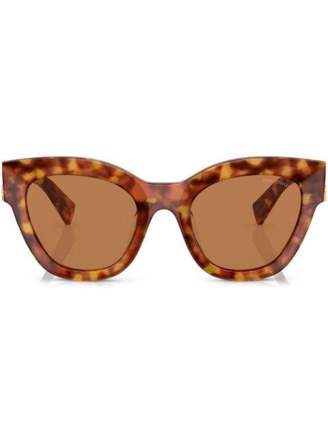 tortoiseshell-effect cat-eye sunglasses by MIU MIU EYEWEAR