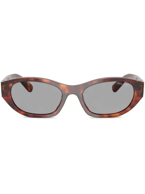 tortoiseshell sunglasses by MIU MIU EYEWEAR