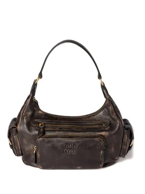 Pocket leather shoulder bag by MIU MIU
