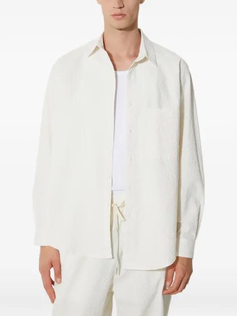 button-fastening shirt by MKI MIYUKI-ZOKU