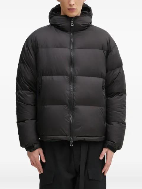 hoodied puffer jacket by MKI MIYUKI-ZOKU