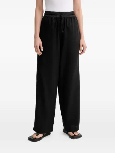 Linen drawstring pocket trousers by MMC STUDIO