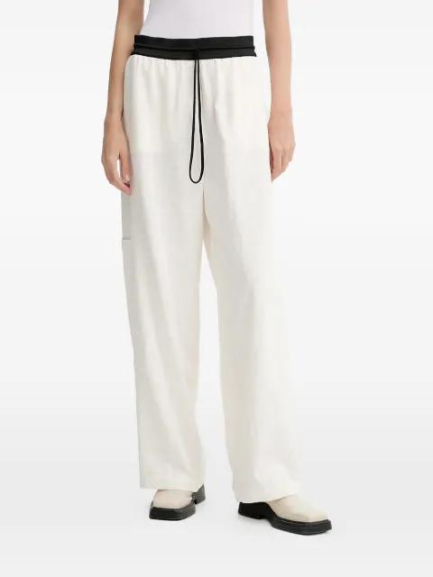 Linen pocket trousers by MMC STUDIO