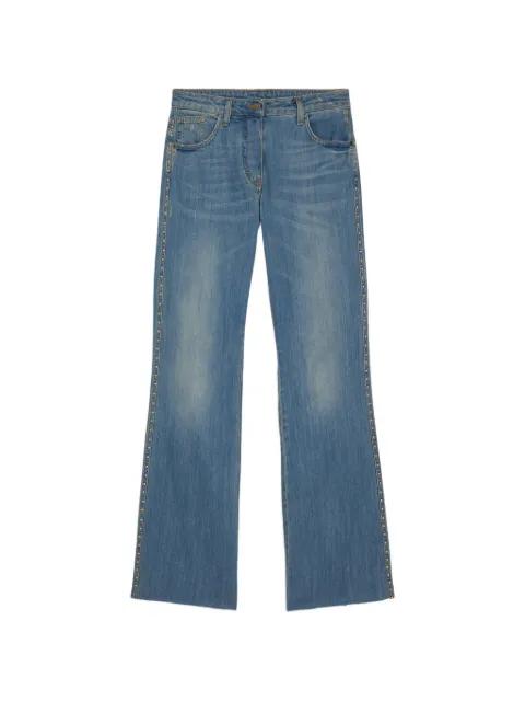 Fuego stud-embellished jeans by MOMONI