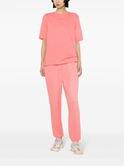 high-waisted logo-embossed track pants by MONCLER