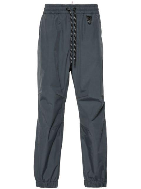 logo-embossed track pants by MONCLER