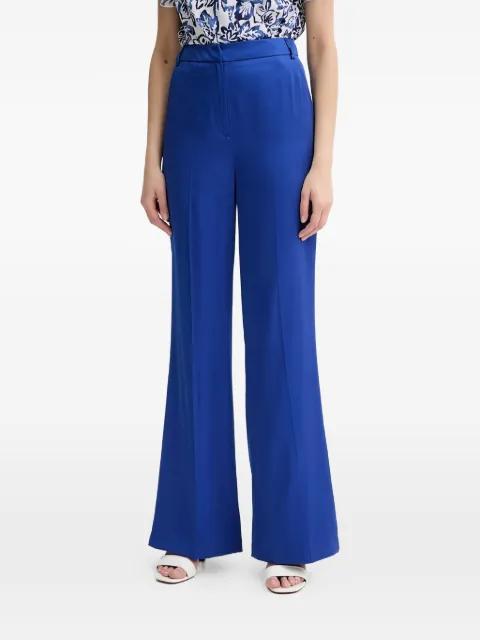 blue flared trousers by MORGAN